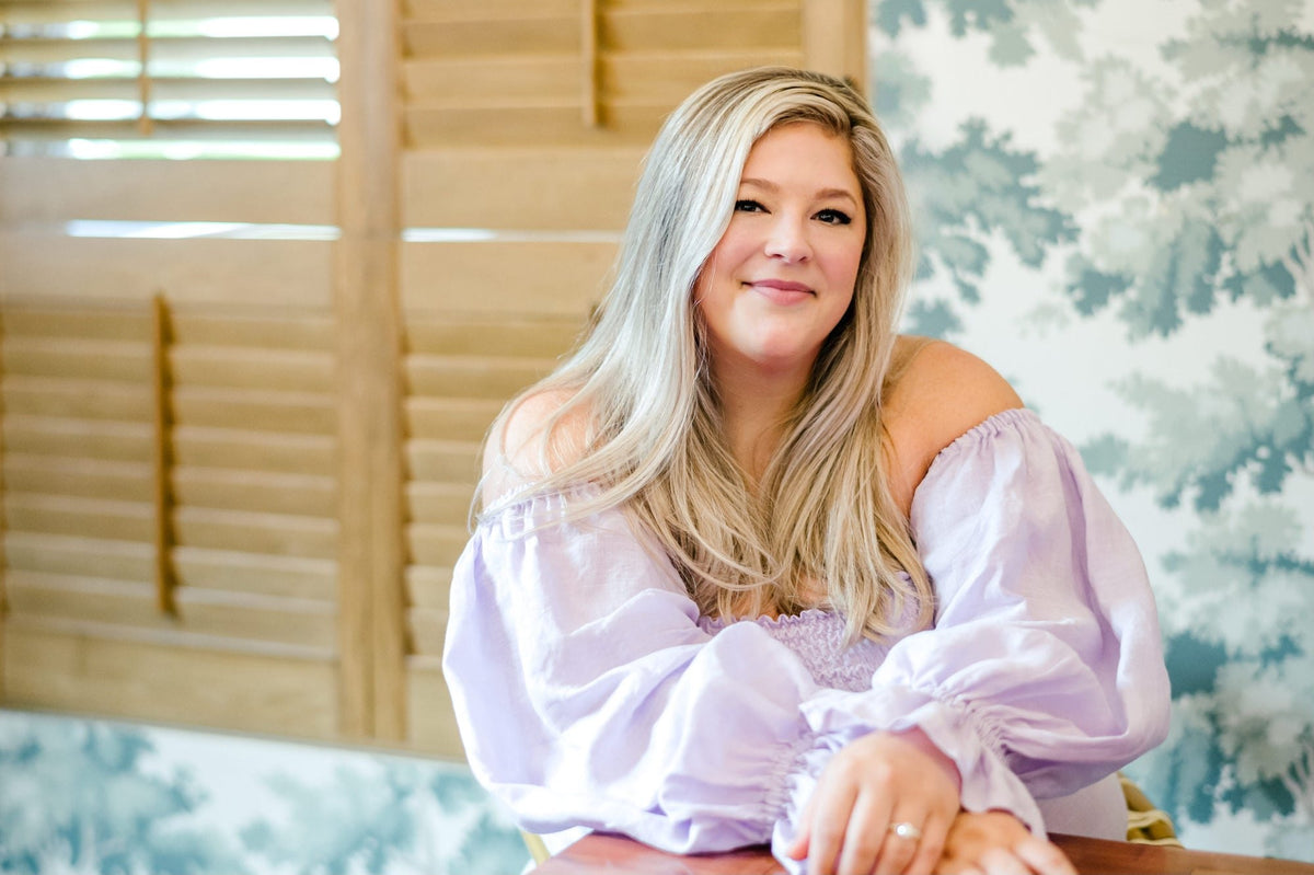 Milan, founder of Magnolia Boone Paperie, luxury wedding invitation studio in Dallas, Texas