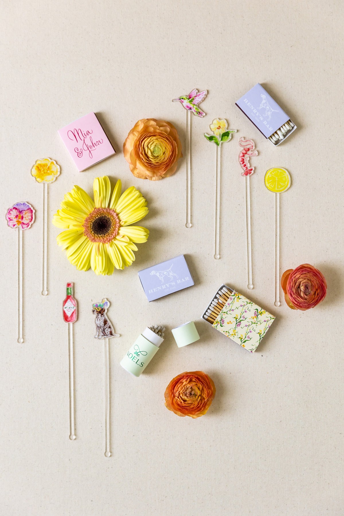 Wedding invitation suite styled with flower lollipops on white linen by Magnolia Boone Paperie
